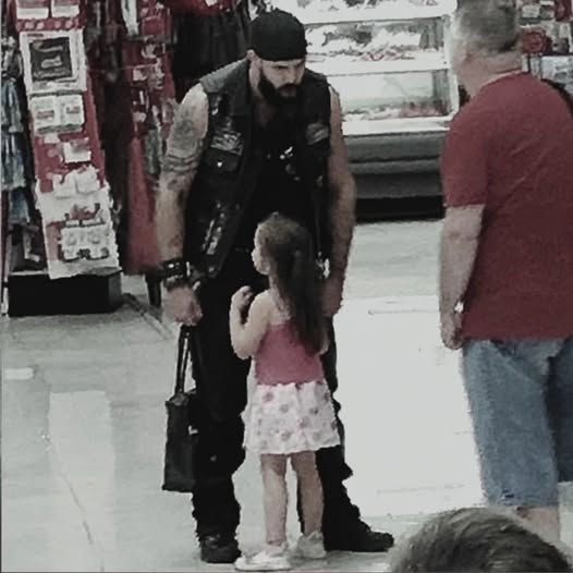 Silent Girl Confronts Mysterious Biker at Walmart