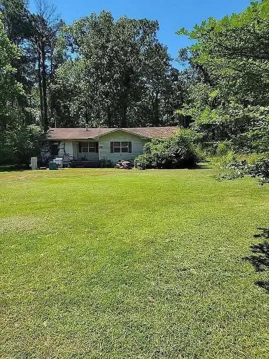 Quiet Country Living Meets Comfort and Privacy in This Hidden Gem Home