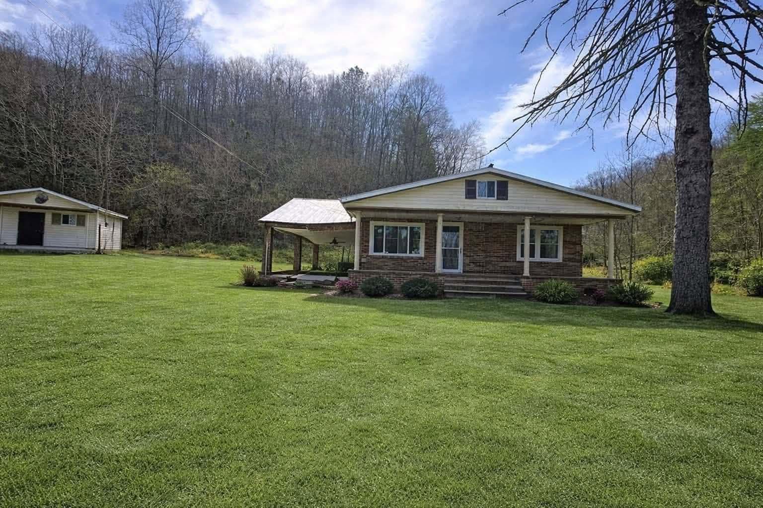 Affordable Brick Home on Nearly 7 Acres with Creek Frontage and Seller Financing